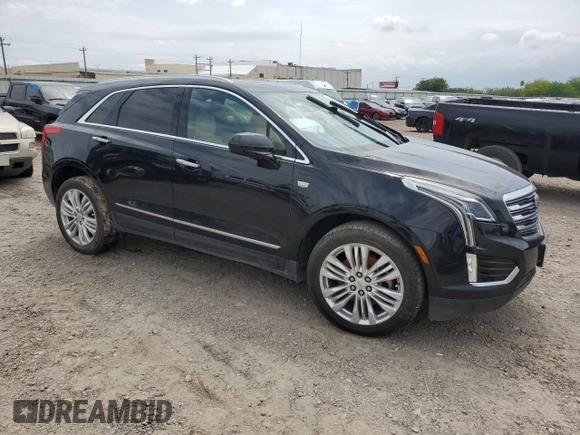 2019 Cadillac XT5 Premium Luxury FWD with VIN 1GYKNERS2KZ235309, listed as a Copart auction lot 54136495 with 133,964 mi miles and Salvage title. Bid and sale history available at DreamBid. Image 4.