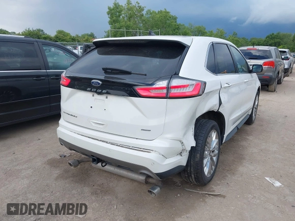 2021 Ford Edge Titanium with VIN 2FMPK4K96MBA18546, listed as a IAAI auction lot 42584326 with 65,214 mi miles and . Bid and sale history available at DreamBid. Image 4.