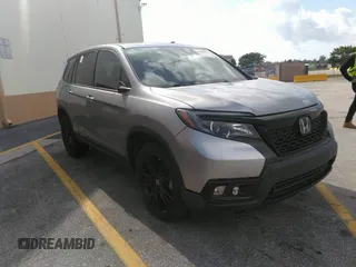 2021 Honda Passport Sport with VIN 5FNYF8H24MB004016, listed as a IAAI auction lot 41696379 with 85,373 mi miles and . Bid and sale history available at DreamBid. Image 1.
