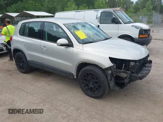 2013 Volkswagen Tiguan SE z VIN WVGBV3AX1DW580011, wystawiony jako IAAI lot #42211462 z przebiegiem 167 072 mil mil oraz . Historia ofert i sprzedaży dostępna na DreamBid. Obrazek 1.
