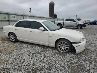 2008 Jaguar XJ with VIN SAJWA79B48SH21186, listed as a Copart auction lot 43704975 with 197,944 mi miles and Salvage Title. Bid and sale history available at carsss.com. Image 4.