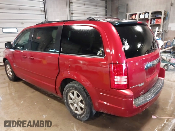 2008 Chrysler Town & Country Touring with VIN 2A8HR54P48R722319, listed as a IAAI auction lot 42262711 with 220,502 mi miles and . Bid and sale history available at DreamBid. Image 3.