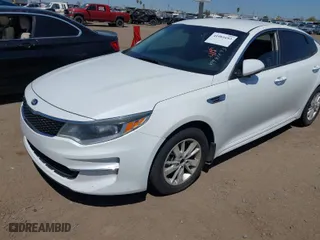2016 Kia Optima LX with VIN 5XXGT4L33GG033022, listed as a IAAI auction lot 41981693 with 137,996 mi miles. Bid and sale history available at carsss.com. Image 2.