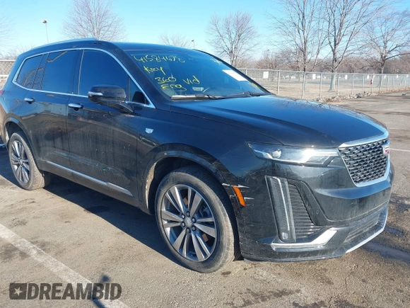 2022 Cadillac XT6 Premium Luxury with VIN 1GYKPDRS5NZ122060, listed as a IAAI auction lot 41584678 with 36,036 mi miles. Bid and sale history available at carsss.com. Image 6.