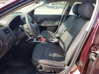 2012 Ford Fusion SE with VIN 3FAHP0HA0CR291458, listed as a Copart auction lot 63357165 with 122,992 mi miles and Salvage title. Bid and sale history available at DreamBid. Image 7.