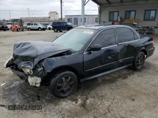 2001 Honda Accord LX z VIN 1HGCG665X1A058192, wystawiony jako Copart lot #57975215 z przebiegiem Nie podano mil oraz Szkoda całkowita • Salvage title. Historia ofert i sprzedaży dostępna na DreamBid. Obrazek 1.