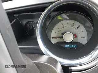 2012 Ford Mustang Premium with VIN 1ZVBP8AM5C5274805, listed as a IAAI auction lot 41934449 with 51,951 mi miles and . Bid and sale history available at DreamBid. Image 7.