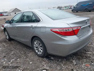 2015 Toyota Camry Hybrid LE with VIN 4T1BD1FK9FU161942, listed as a IAAI auction lot 41880622 with 216,632 mi miles. Bid and sale history available at carsss.com. Image 3.