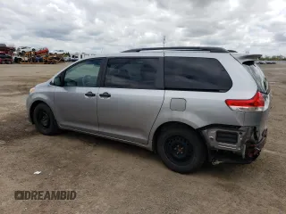 2011 Toyota Sienna z VIN 5TDZK3DC3BS016426, wystawiony jako Copart lot #57070075 z przebiegiem 270 749 mil mil oraz Szkoda całkowita • Salvage title. Historia ofert i sprzedaży dostępna na DreamBid. Obrazek 2.