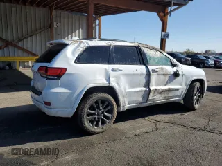 2018 Jeep Grand Cherokee Altitude with VIN 1C4RJFAG7JC257112, listed as a Copart auction lot 53370415 with 124,154 mi miles and Salvage title. Bid and sale history available at DreamBid. Image 3.