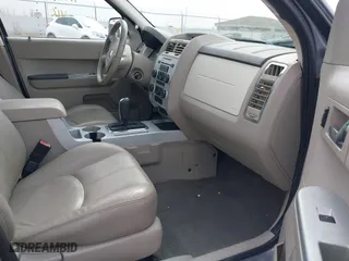 2008 Mercury Mariner with VIN 4M2CU91118KJ13477, listed as a IAAI auction lot 41987552 with 130,238 mi miles. Bid and sale history available at carsss.com. Image 5.