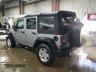 2014 Jeep Wrangler Unlimited Sport with VIN 1C4BJWDG9EL140263, listed as a Copart auction lot 47652785 with 39,493 mi miles and Salvage Title. Bid and sale history available at DreamBid. Image 2.