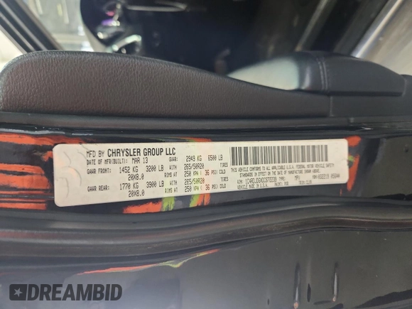 2013 Dodge Durango Crew z VIN 1C4RDJDGXDC672239, wystawiony jako Copart lot #59227905 z przebiegiem 167 982 mil mil oraz Szkoda całkowita • Salvage title. Historia ofert i sprzedaży dostępna na DreamBid. Obrazek 14.