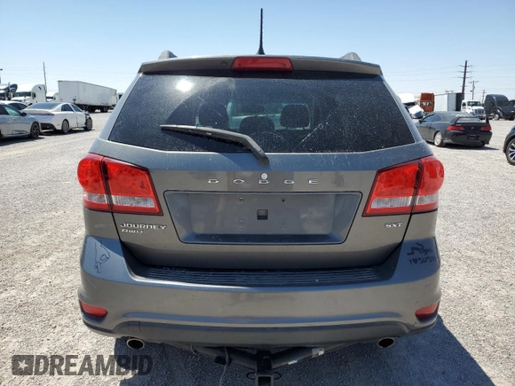2012 Dodge Journey SXT z VIN 3C4PDDBG0CT345864, wystawiony jako Copart lot #55453875 z przebiegiem 142 444 mil mil oraz Szkoda całkowita • Salvage title. Historia ofert i sprzedaży dostępna na DreamBid. Obrazek 6.