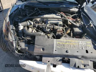1994 Ford Mustang with VIN 1FALP45T2RF185428, listed as a Copart auction lot 55990495 with 111,353 mi miles and Salvage title. Bid and sale history available at DreamBid. Image 11.