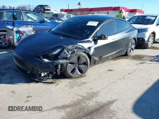 2020 Tesla Model 3 Standard Range Plus with VIN 5YJ3E1EA4LF745491, listed as a IAAI auction lot 41186726 with 74,575 mi miles and . Bid and sale history available at DreamBid. Image 21.