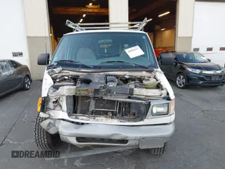 2000 Ford Econoline Cargo with VIN 1FTNS2422YHB94809, listed as a IAAI auction lot 40999427 with 154,779 mi miles and . Bid and sale history available at DreamBid. Image 13.