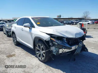 2017 Lexus RX with VIN 2T2ZZMCA5HC060703, listed as a IAAI auction lot 41853732 with 74,311 mi miles. Bid and sale history available at carsss.com. Image 1.
