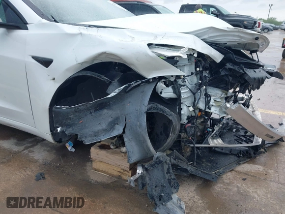 2023 Tesla Model 3 Performance z VIN 5YJ3E1EC8PF487550, wystawiony jako IAAI lot #42093712 z przebiegiem 27 305 mil mil oraz . Historia ofert i sprzedaży dostępna na DreamBid. Obrazek 19.