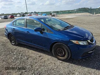 2015 Honda Civic LX with VIN 19XFB2F50FE033003, listed as a Copart auction lot 52004115 with 127,994 mi miles and Clean Title. Bid and sale history available at DreamBid. Image 4.