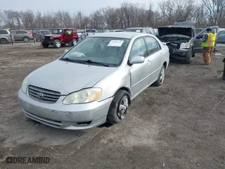 2004 Toyota Corolla CE with VIN 1NXBR32E74Z329751, listed as a IAAI auction lot 41489611 with 128,471 mi miles. Bid and sale history available at carsss.com. Image 17.