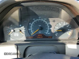 1997 Mercedes-Benz E 320 with VIN WDBJF55FXVA430115, listed as a Copart auction lot 43053715 with 158,057 mi miles and Clean Title. Bid and sale history available at DreamBid. Image 9.