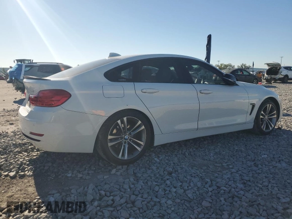 2015 BMW 4 Series 428i with VIN WBA4A5C53FD410938, listed as a Copart auction lot 49051655 with 114,459 mi miles and Salvage Title. Bid and sale history available at DreamBid. Image 3.