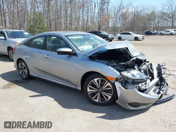 2018 Honda Civic EX-L with VIN JHMFC1F72JX043788, listed as a IAAI auction lot 41853131 with 137,266 mi miles and . Bid and sale history available at DreamBid. Image 1.
