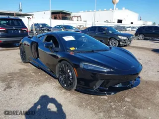 2020 McLaren GT with VIN SBM22GCA1LW000498, listed as a IAAI auction lot 41265247 with NaN miles. Bid and sale history available at carsss.com. Image 1.