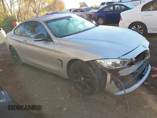 2015 BMW 4 Series 435i xDrive z VIN WBA3R5C5XFK371491, wystawiony jako IAAI lot #40755251 z przebiegiem 122 181 mil mil oraz . Historia ofert i sprzedaży dostępna na DreamBid. Obrazek 1.