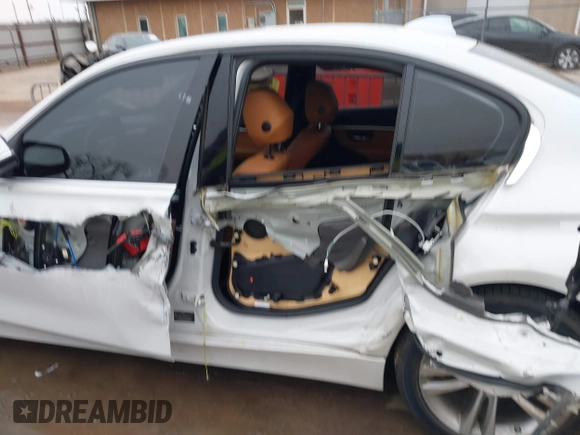 2018 BMW 3 Series 330i with VIN WBA8B9G53JNU57549, listed as a IAAI auction lot 41521049 with 63,557 mi miles and . Bid and sale history available at DreamBid. Image 14.