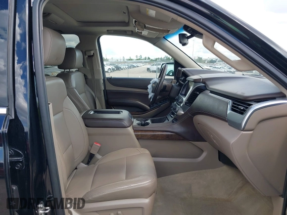 2015 Chevrolet Tahoe LT with VIN 1GNSCBKCXFR214072, listed as a IAAI auction lot 40512435 with 98,955 mi miles and . Bid and sale history available at DreamBid. Image 5.