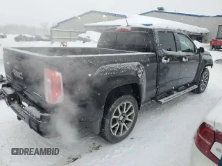 2019 GMC Canyon 4WD Denali with VIN 1GTG6EEN3K1348726, listed as a Copart auction lot 44446865 with 71,533 mi miles and Salvage Title. Bid and sale history available at carsss.com. Image 3.