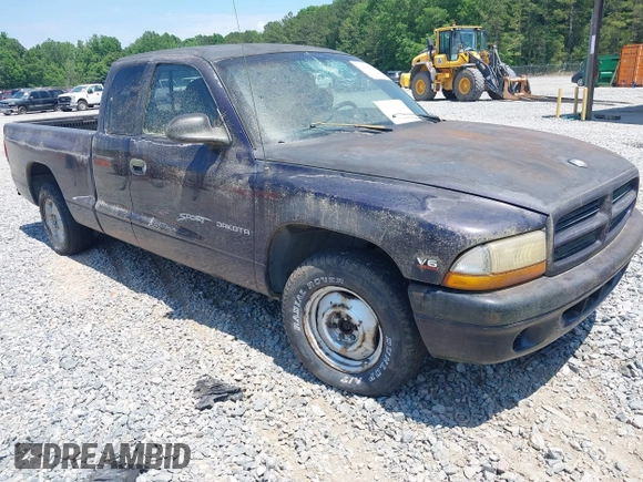 1998 Dodge Dakota SLT with VIN 1B7GL22X3WS569885, listed as a IAAI auction lot 42128994 with 1 mi miles. Bid and sale history available at carsss.com. Image 1.