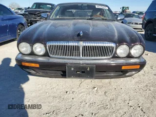 1995 Jaguar XJ with VIN SAJKX1743SC734007, listed as a Copart auction lot 46340825 with 130,115 mi miles and Salvage Title. Bid and sale history available at DreamBid. Image 5.