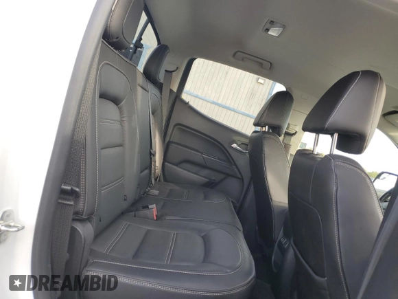 2018 GMC Canyon 4WD Denali with VIN 1GTG6EEN1J1107696, listed as a Copart auction lot 82138944 with 91,136 mi miles and Salvage Title. Bid and sale history available at carsss.com. Image 10.