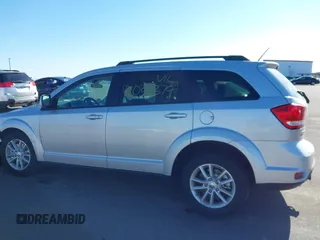 2013 Dodge Journey SXT with VIN 3C4PDDBG4DT506900, listed as a IAAI auction lot 42032379 with 130,911 mi miles and . Bid and sale history available at DreamBid. Image 14.