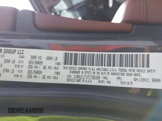 2015 Jeep Grand Cherokee Summit with VIN 1C4RJFJT1FC726330, listed as a IAAI auction lot 41781127 with 138,425 mi miles. Bid and sale history available at carsss.com. Image 9.