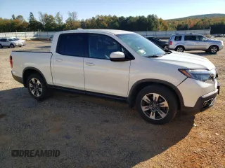 2019 Honda Ridgeline Sport with VIN 5FPYK2F14KB004329, listed as a Copart auction lot 76247454 with 132,291 mi miles and Salvage title. Bid and sale history available at DreamBid. Image 4.