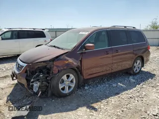2010 Honda Odyssey Touring with VIN 5FNRL3H97AB079995, listed as a Copart auction lot 48577895 with 163,219 mi miles and Salvage title. Bid and sale history available at DreamBid. Image 1.
