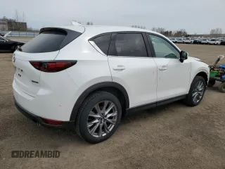 2021 Mazda CX-5 Grand Touring with VIN JM3KFBDM7M1122281, listed as a Copart auction lot 54576485 with 93,008 mi miles and Salvage Title. Bid and sale history available at DreamBid. Image 3.