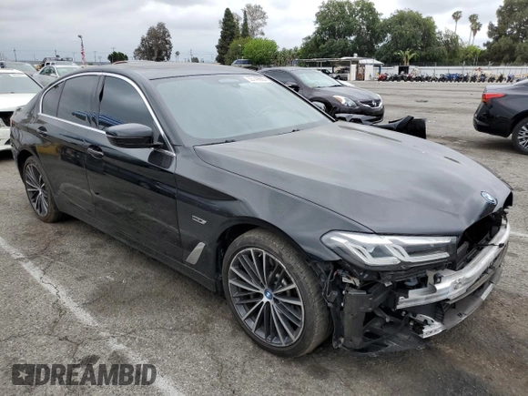 2023 BMW 5 Series 530e with VIN WBA13AG01PCM24624, listed as a Copart auction lot 55149855 with 26,022 mi miles and Salvage title. Bid and sale history available at DreamBid. Image 4.