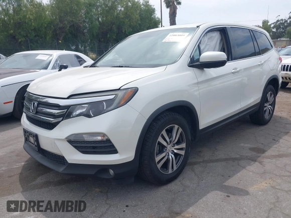 2016 Honda Pilot EX-L with VIN 5FNYF5H55GB015166, listed as a IAAI auction lot 42003009 with 142,488 mi miles and . Bid and sale history available at DreamBid. Image 17.