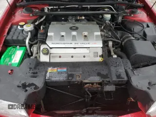 2001 Cadillac Eldorado ESC z VIN 1G6EL12Y61B107519, wystawiony jako Copart lot #38051744 z przebiegiem 52 018 mil mil oraz Czysty tytuł • Clean title. Historia ofert i sprzedaży dostępna na DreamBid. Obrazek 11.
