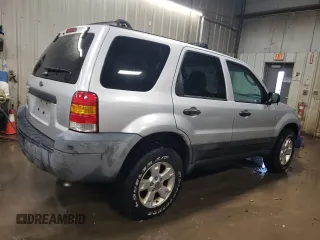 2005 Ford Escape XLT z VIN 1FMYU93145KA20050, wystawiony jako Copart lot #76794024 z przebiegiem 98 559 mil mil oraz Szkoda całkowita • Salvage title. Historia ofert i sprzedaży dostępna na DreamBid. Obrazek 3.