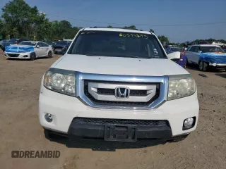 2011 Honda Pilot EX-L z VIN 5FNYF4H54BB031703, wystawiony jako Copart lot #60595295 z przebiegiem Nie podano mil oraz Czysty tytuł • Clean title. Historia ofert i sprzedaży dostępna na DreamBid. Obrazek 5.