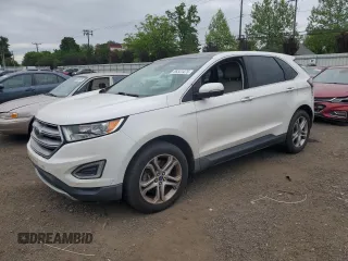 2015 Ford Edge Titanium z VIN 2FMPK4K88FBC05216, wystawiony jako Copart lot #56523475 z przebiegiem 156 558 mil mil oraz Szkoda całkowita • Salvage title. Historia ofert i sprzedaży dostępna na DreamBid. Obrazek 1.