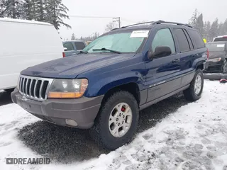 2001 Jeep Grand Cherokee Laredo with VIN 1J4GW48N21C730703, listed as a IAAI auction lot 41581667 with 111,054 mi miles. Bid and sale history available at carsss.com. Image 18.