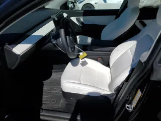 2022 Tesla Model Y Long Range z VIN 7SAYGDEE2NF442073, wystawiony jako Copart lot #49180135 z przebiegiem 34 742 mil mil oraz Szkoda całkowita • Salvage title. Historia ofert i sprzedaży dostępna na DreamBid. Obrazek 7.