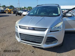 2013 Ford Escape SE with VIN 1FMCU9GX5DUD34978, listed as a IAAI auction lot 42570946 with 133,408 mi miles and . Bid and sale history available at DreamBid. Image 6.